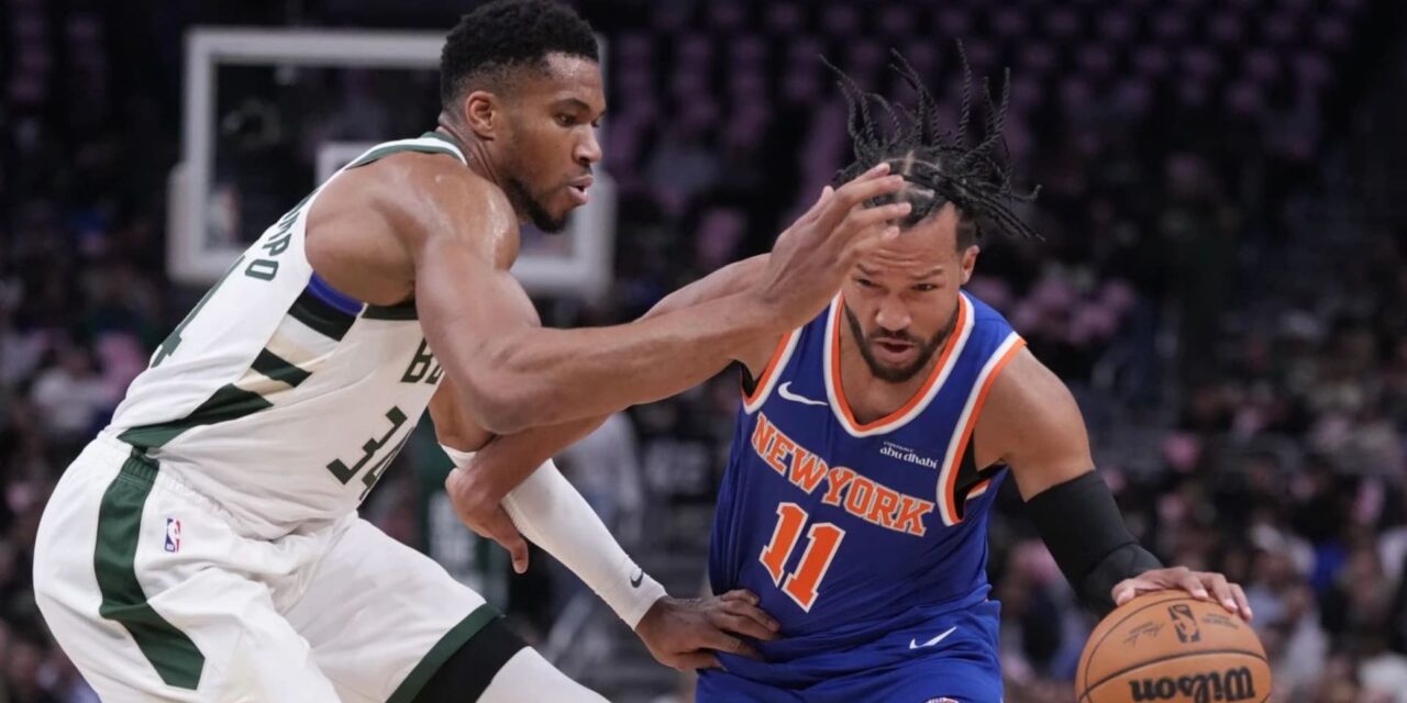 Giannis Antetokounmpo guarding Jalen Brunson