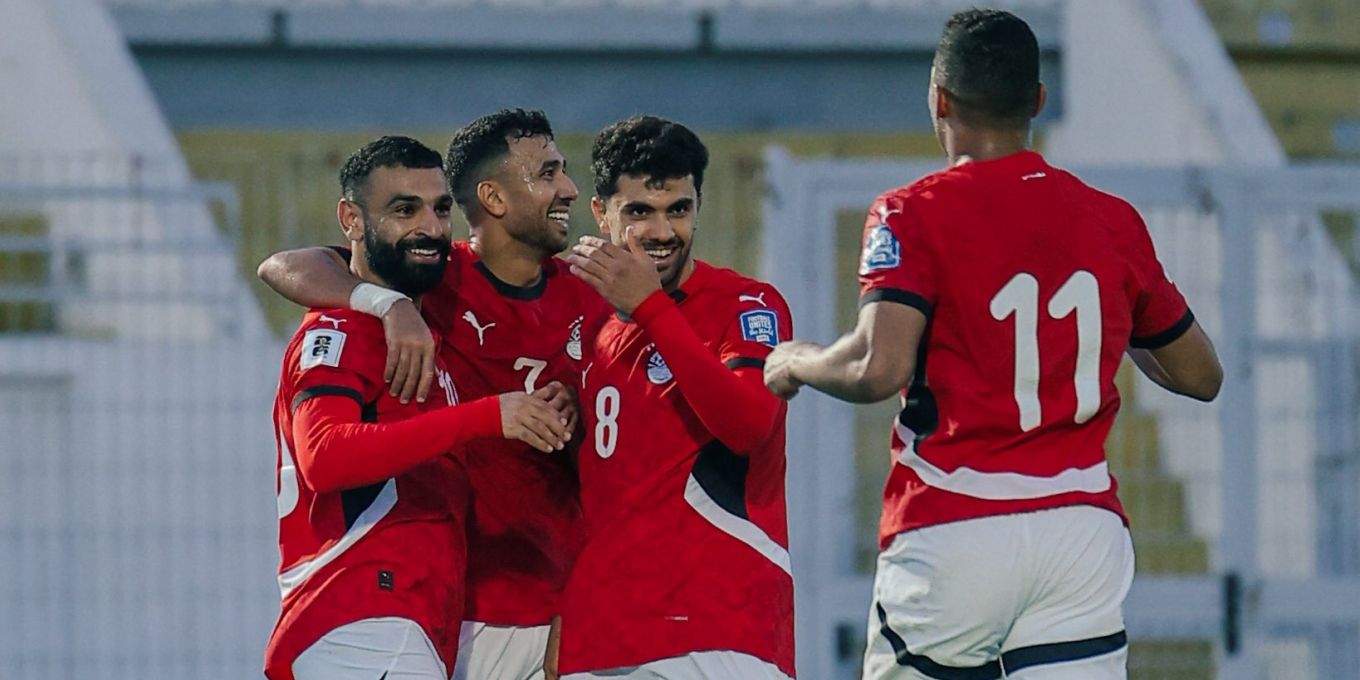 Egypt players celebrate after scoring a goal
