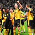 Borussia Dortmund players celebrate after eliminating Eintracht Frankfurt on penalties