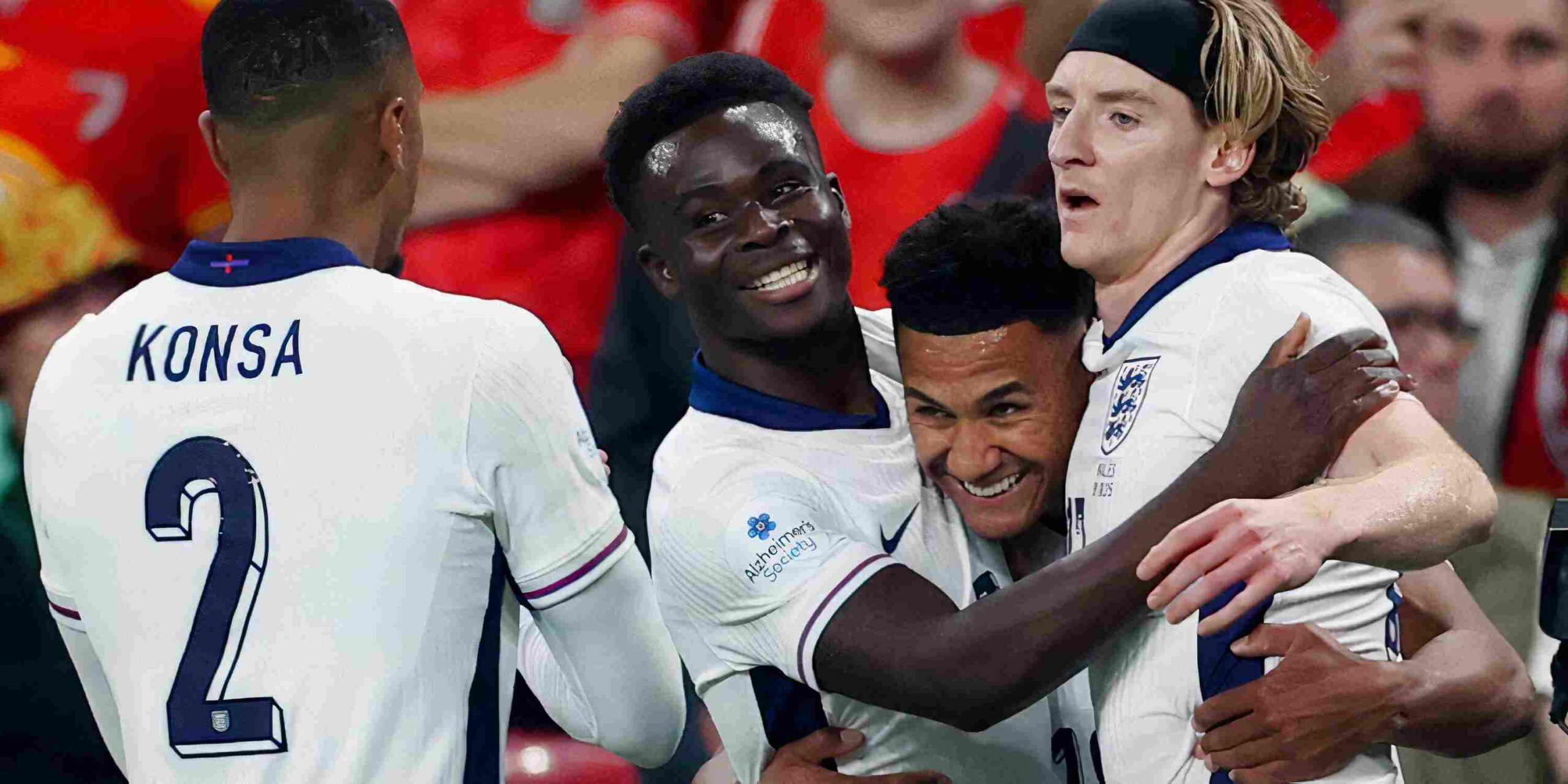 England players celebrate after scoring against Wales