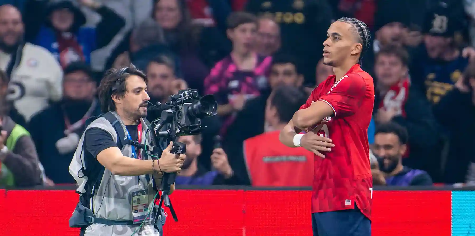 Ethan Mbappe celebrates after scoring against PSG