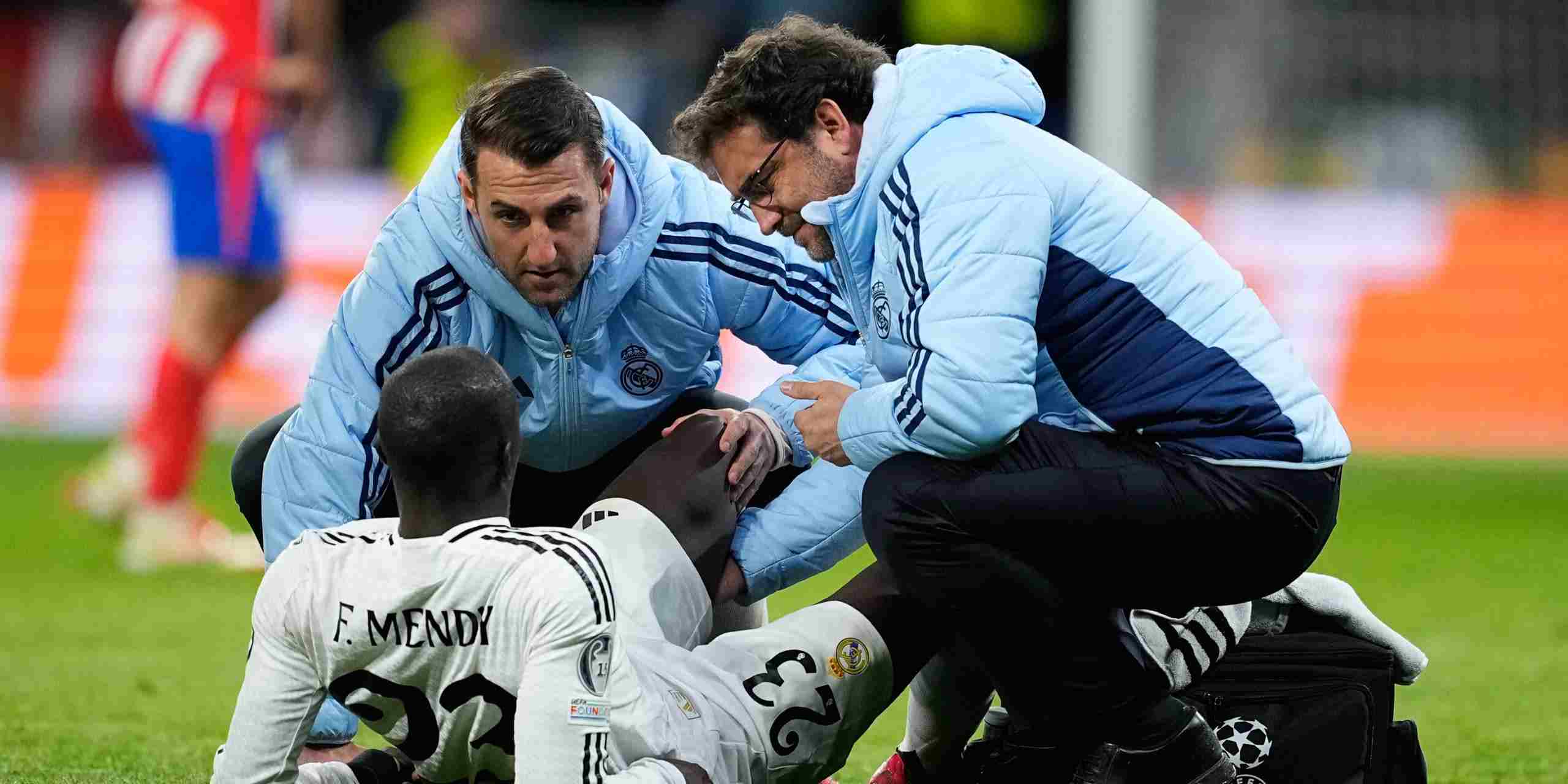 Ferland Mendy laying on the field with an injury