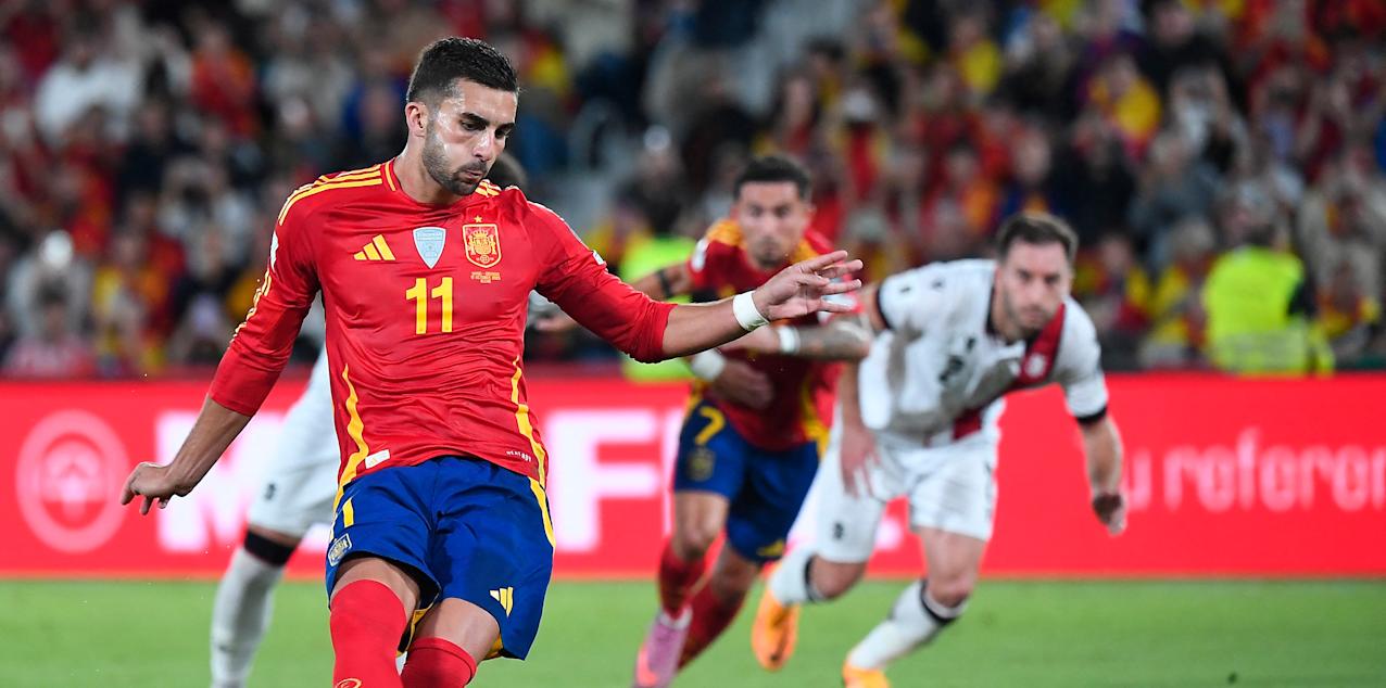 Spain forward Ferran Torres executing a penalty kick