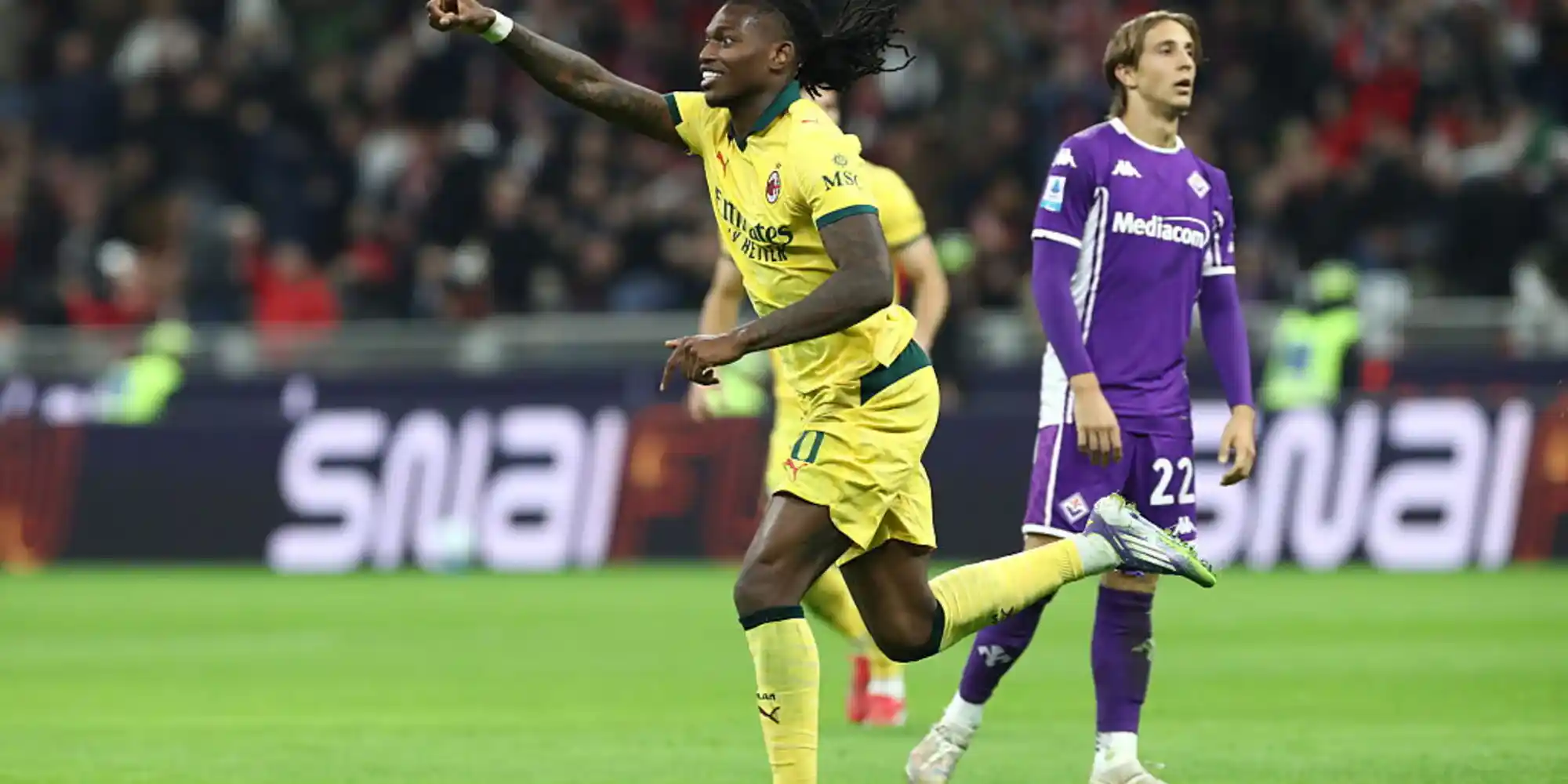 Rafael Leao runs to celebrate after scoring against Fiorentina