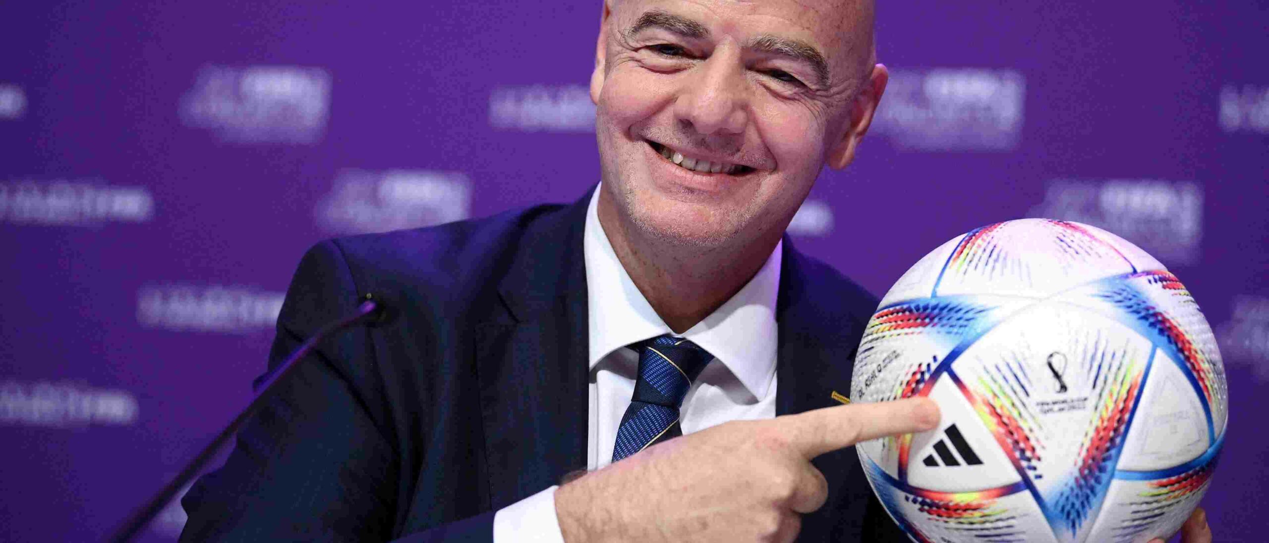 FIFA president Gianni Infantino showing the 2026 World Cup ball