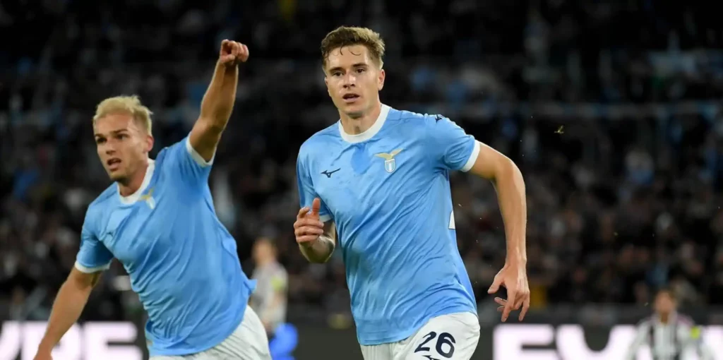 Toma Basic celebrates after scoring against Juventus