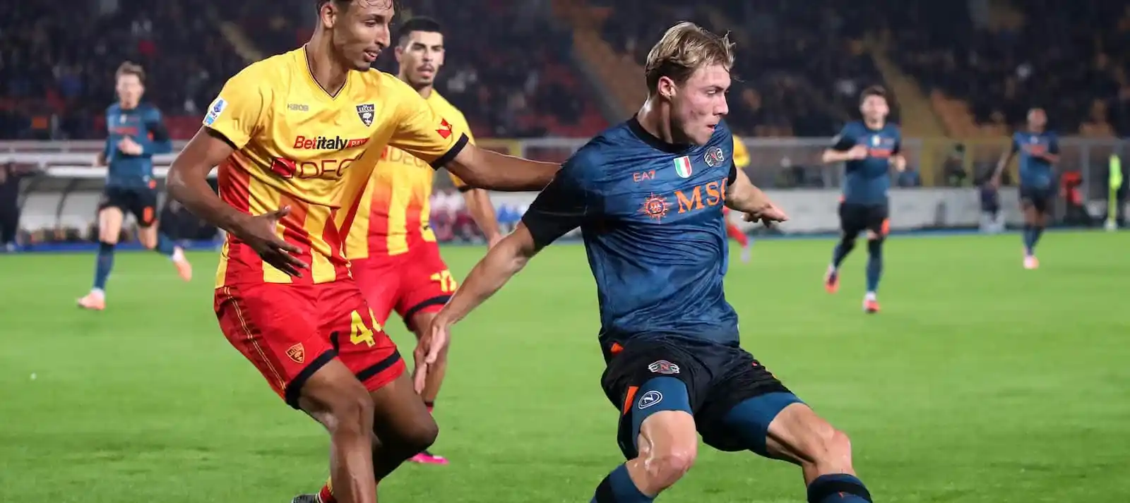 Rasmus Hojlund protecting the ball from a Lecce opponent
