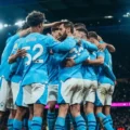 Manchester City players gathered in a circle