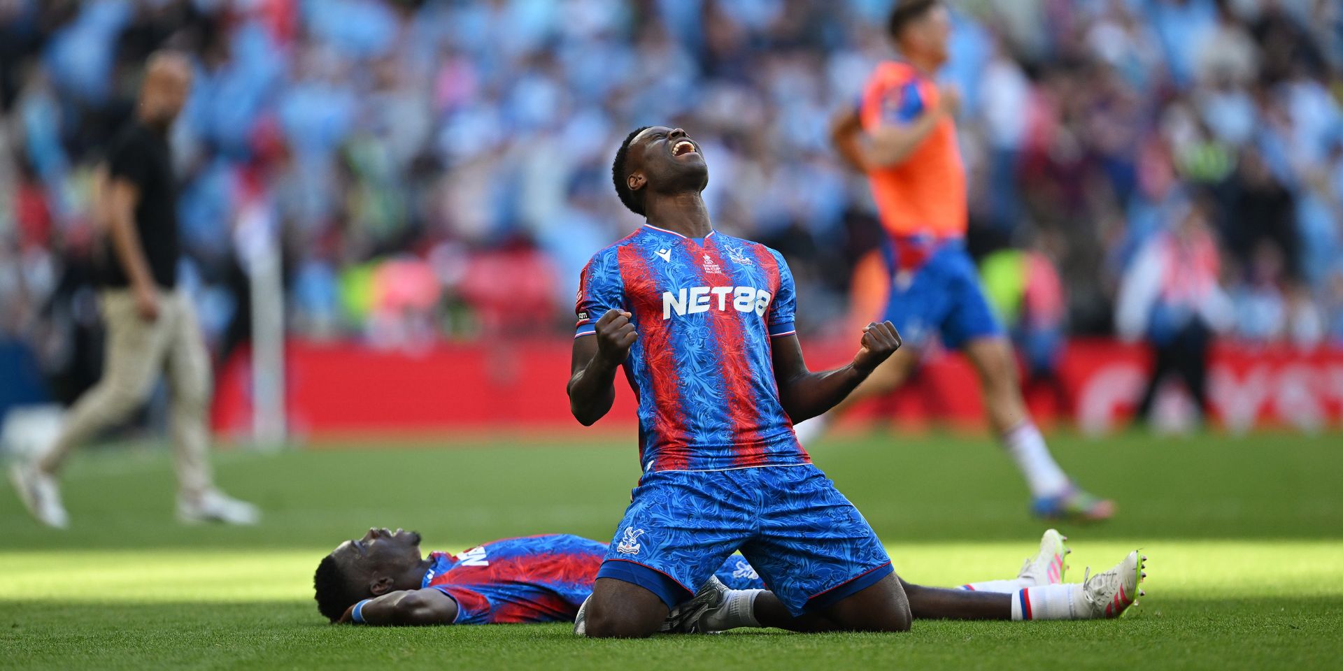 Marc Guehi triumphant on his knees
