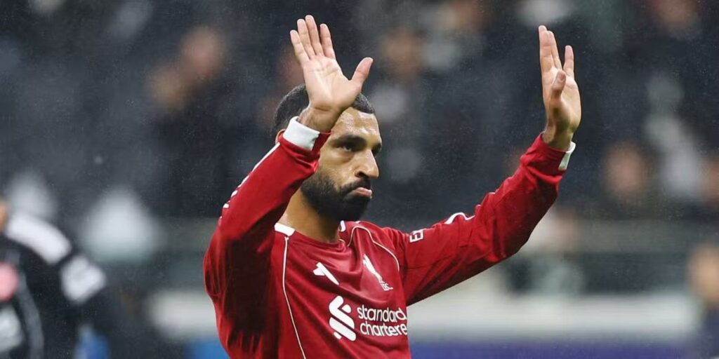 Mohamed Salah with hands in the air