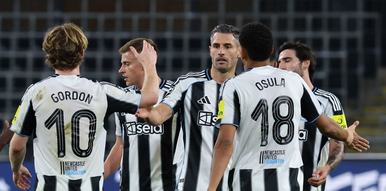 Newcastle players congratulating one another after scoring against Union SG
