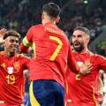 Alvaro Morata, Lamine Yamal, and Dani Carvajal celebrate Spain's goal