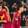 Roma players celebrate after scoring a goal