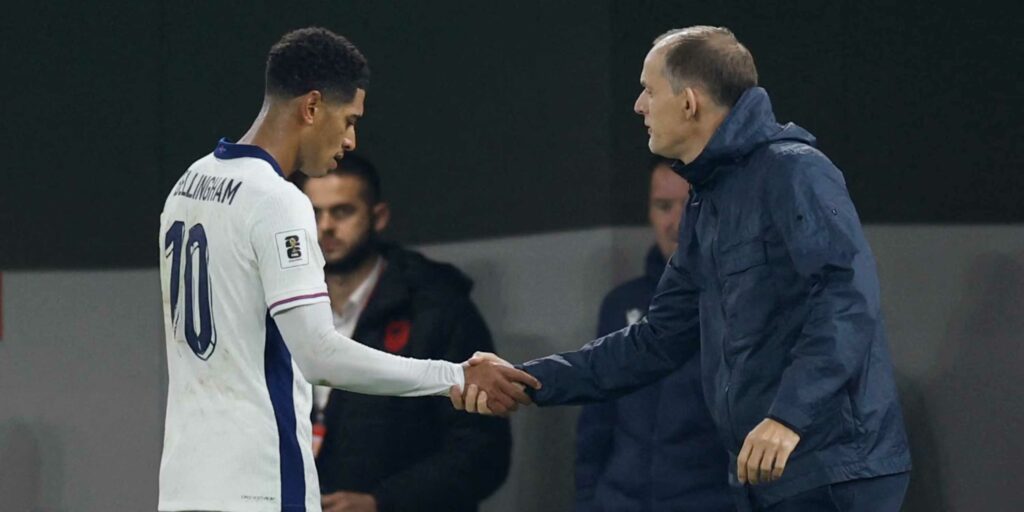 Jude Bellingham and Thomas Tuchel shaking hands