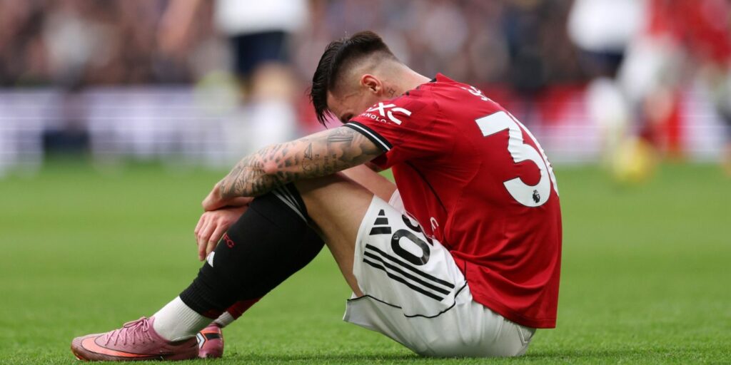 Benjamin Sesko sitting on the field