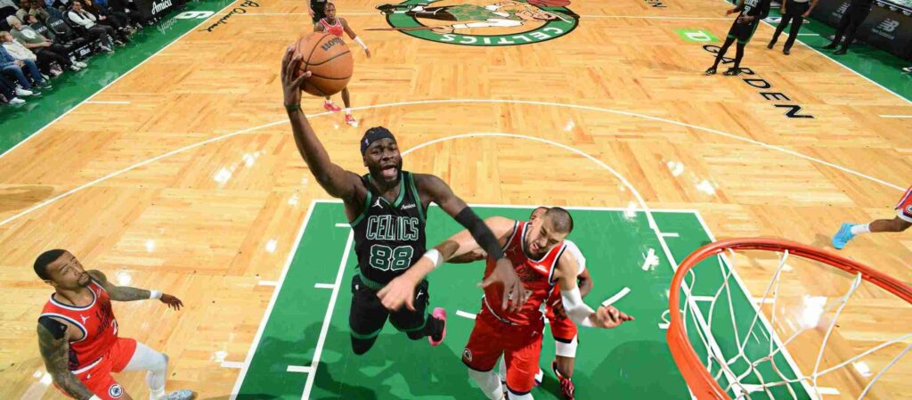 Neemias Queta attacking Los Angles Clippers' rim