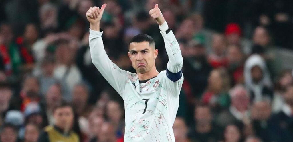 Cristiano Ronaldo reacts to being shown first ever red card in Portugal's shirt