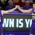 Luka Doncic and Austin Reaves congratulating each other