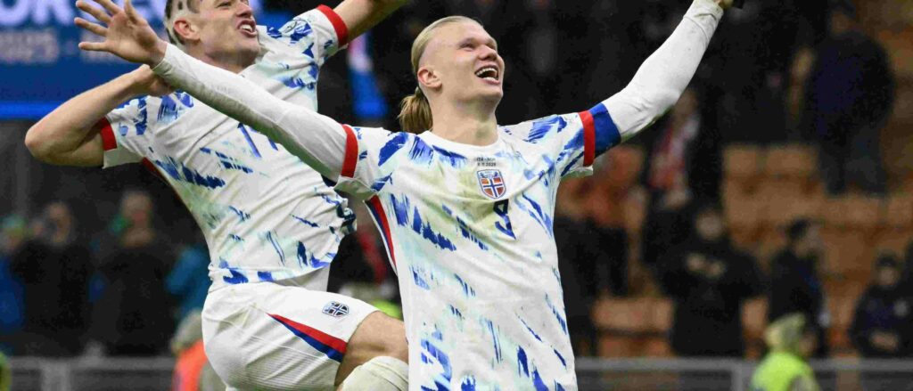 Erling Haaland celebrates after scoring against Italy