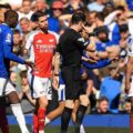 Myles Lewis-Skelly receiving red card in Arsenal's match against Everton
