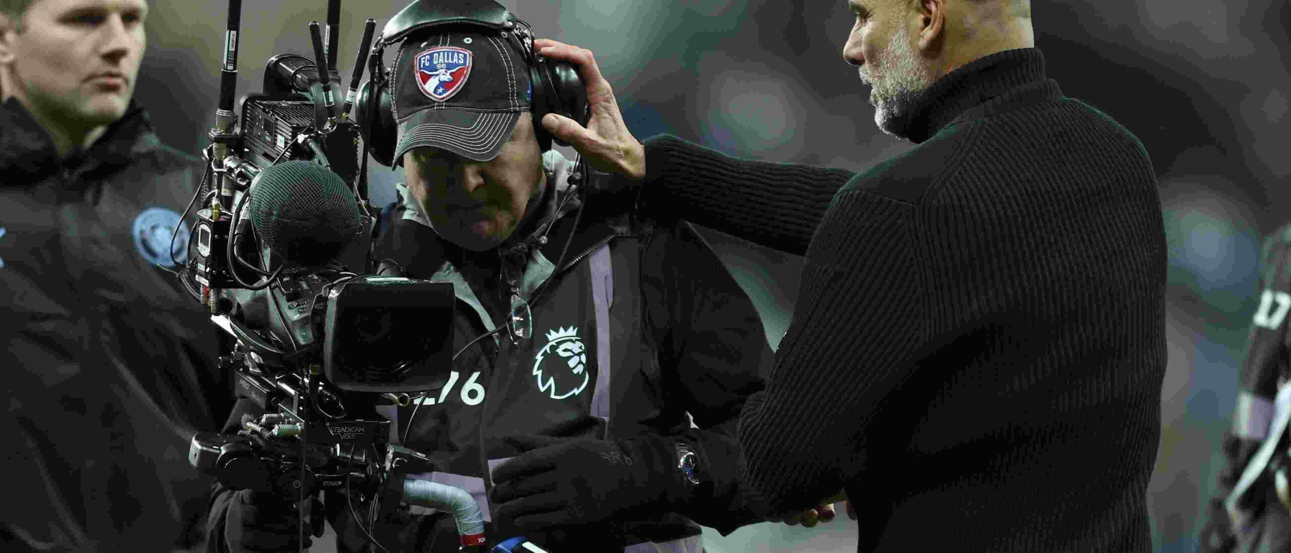 Pep Guardiola clashing with a cameraman