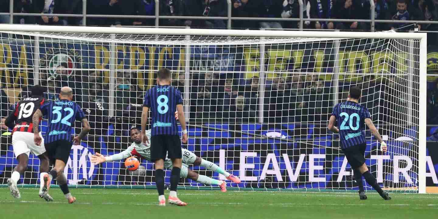 Mike Maignan saving Hakan Calhanoglu's penalty in the Milan derby