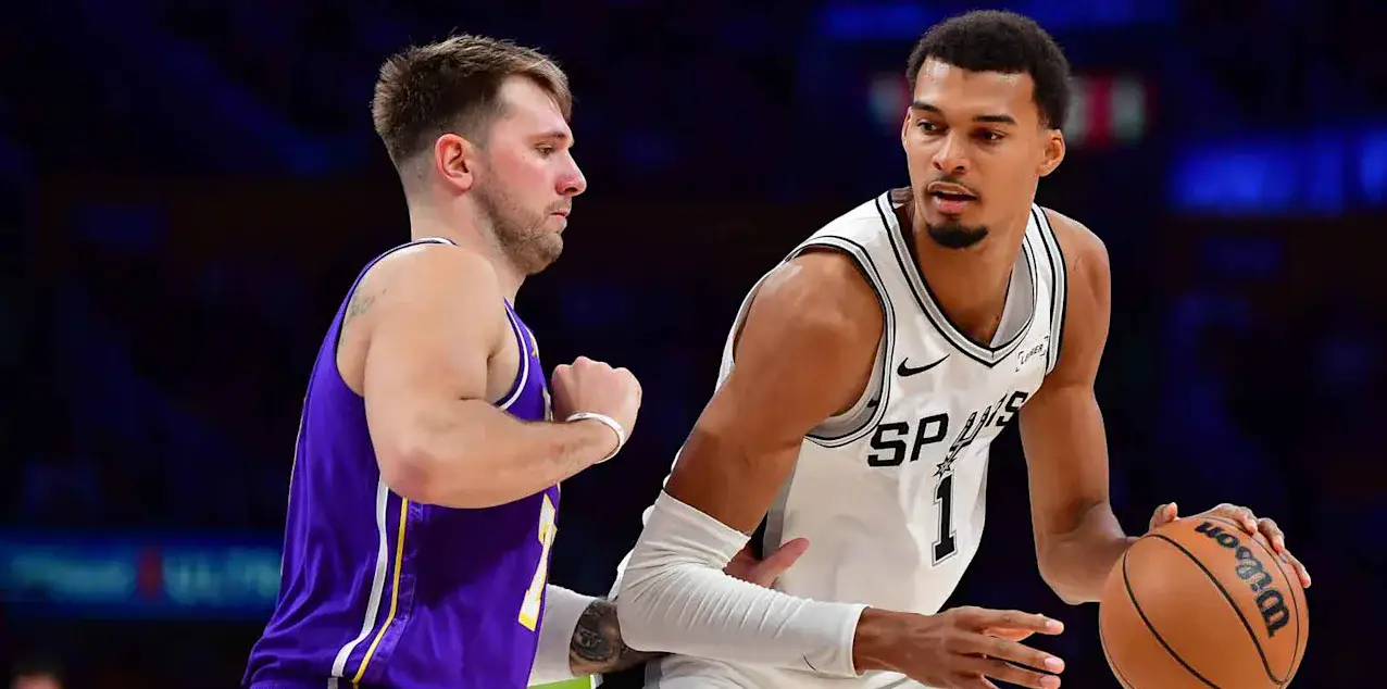 Luka Doncic guarding Victor Wembanyama