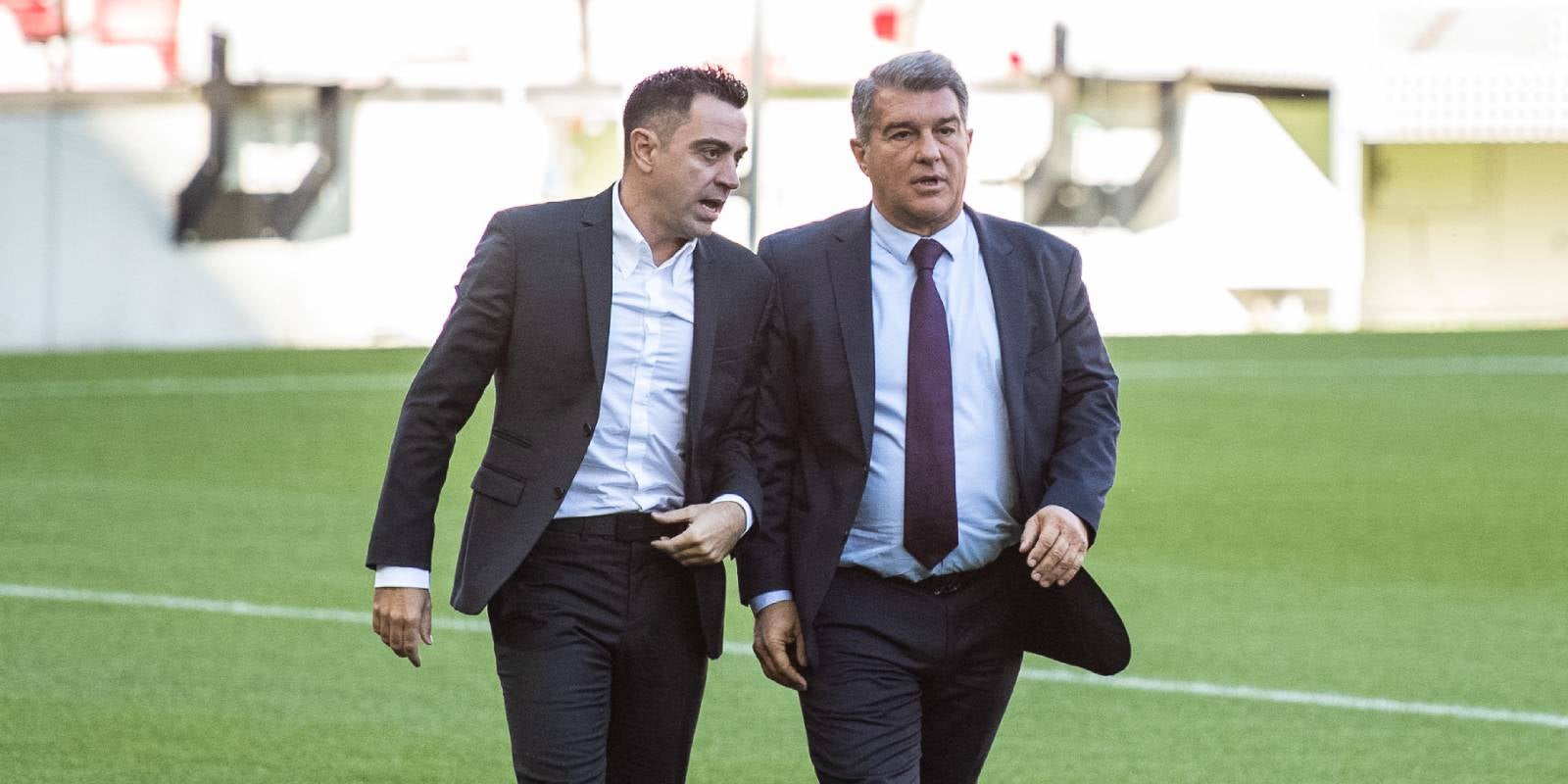 Xavi Hernandez and Joan Laporta