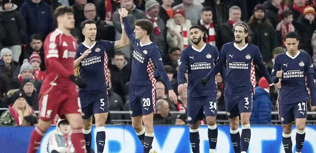 PSV players celebrate after scoring against Liverpool