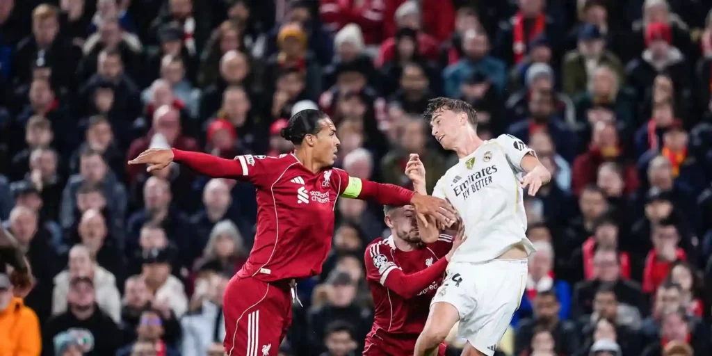 Virgil Van Dijk and Dean Huijsen in an aerial duel