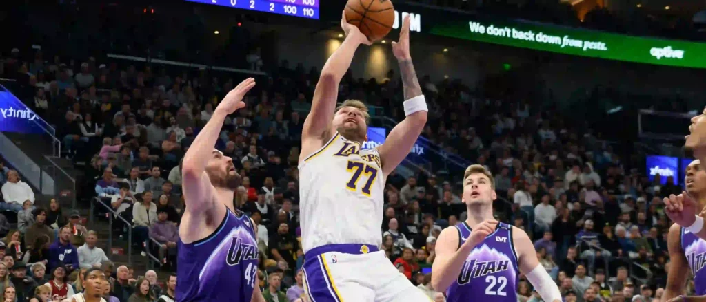 Luka Doncic shoots at Utah Jazz' basket