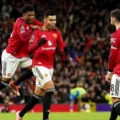 Casemiro, Amad, and Bruno Fernandes celebrate Manchester United goal