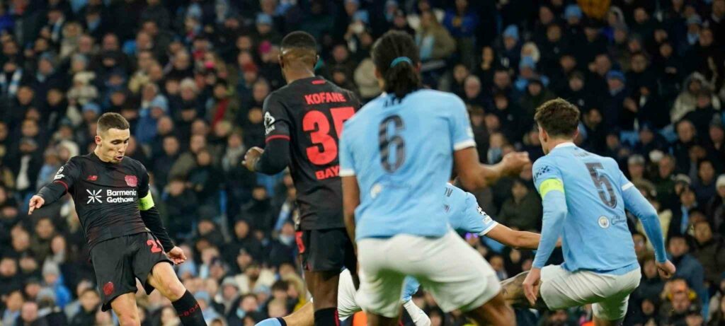 Alejandro Grimaldo shoots towards Manchester City goal