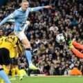 Erling Haaland sees his shot blocked by Borussia Dortmund goalkeeper