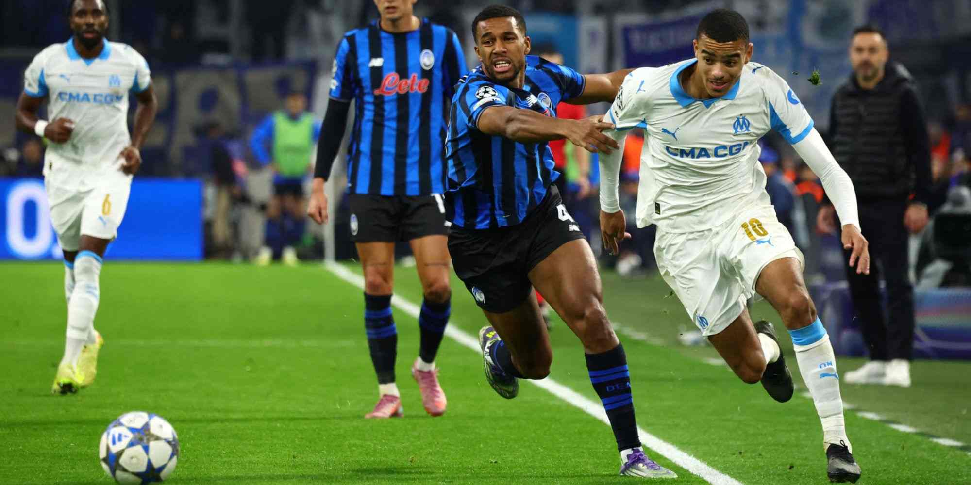 Mason Greenwood dribbles past Atalanta player