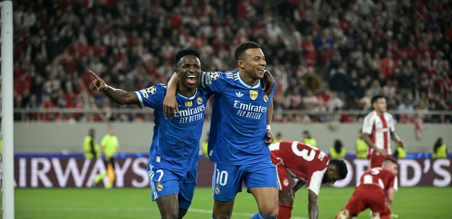 Kylian Mbappe and Vinicius Junior celebrate Real Madrid goal against Olympiacos