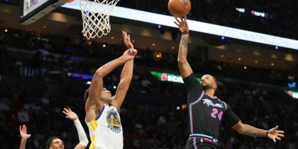 Norman Powell shoots at Golden State Warriors basket