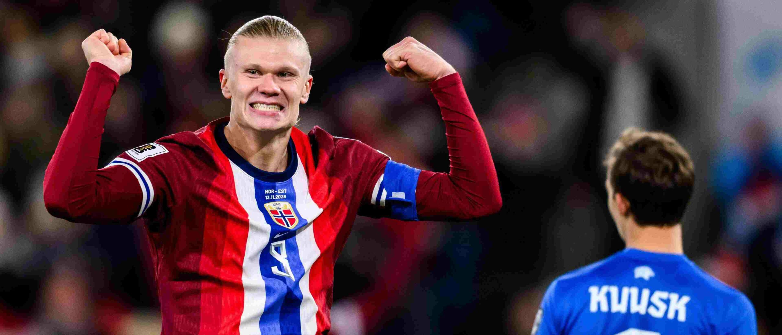 Erling Haaland smiling after scoring against Estonia