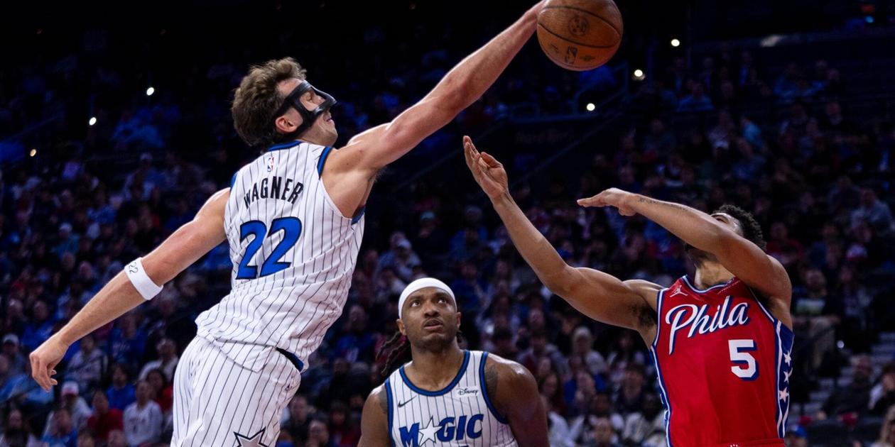 Franz Wagner blocks a shot from Philadelphia 76ers player