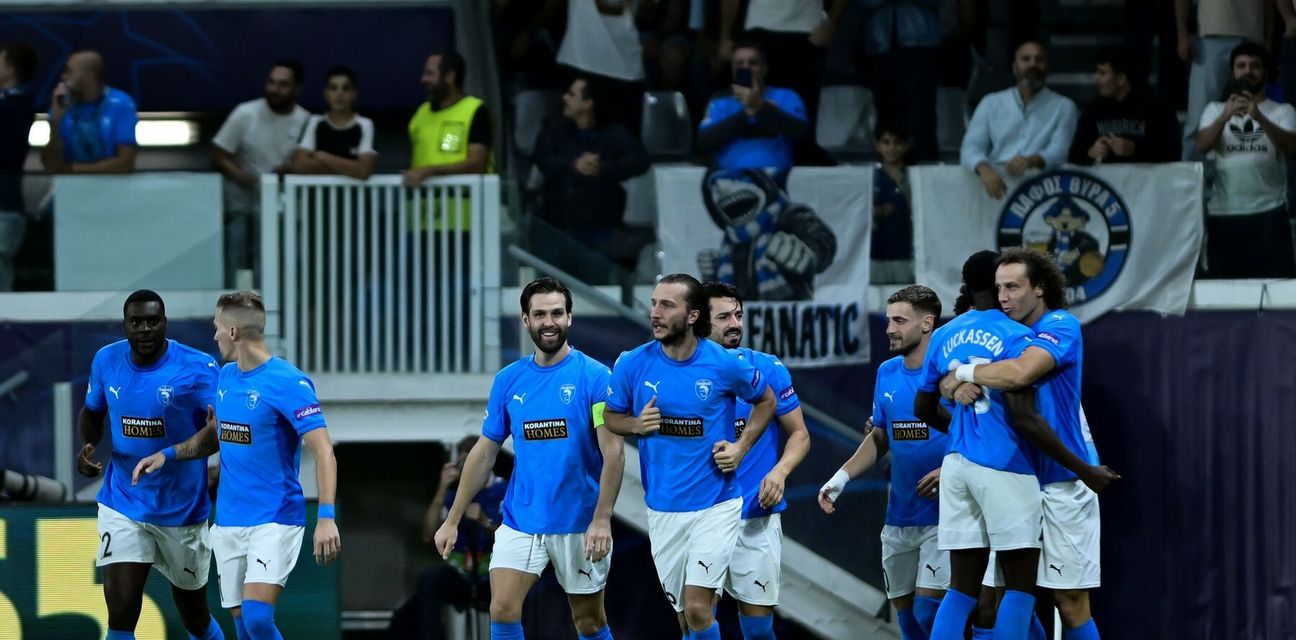 Pafos players celebrate after scoring against Monaco