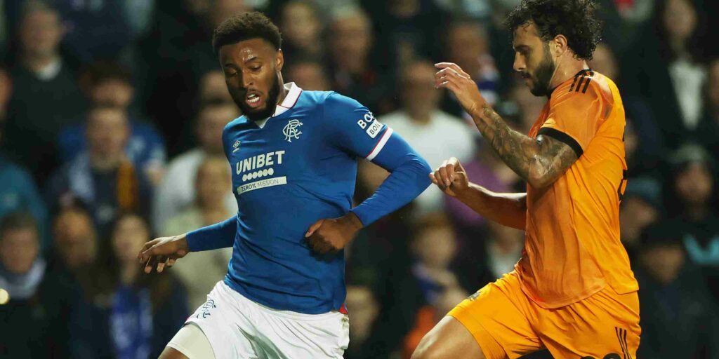 Duel between Rangers and Roma players