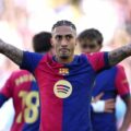 Raphinha celebrates after scoring for Barcelona