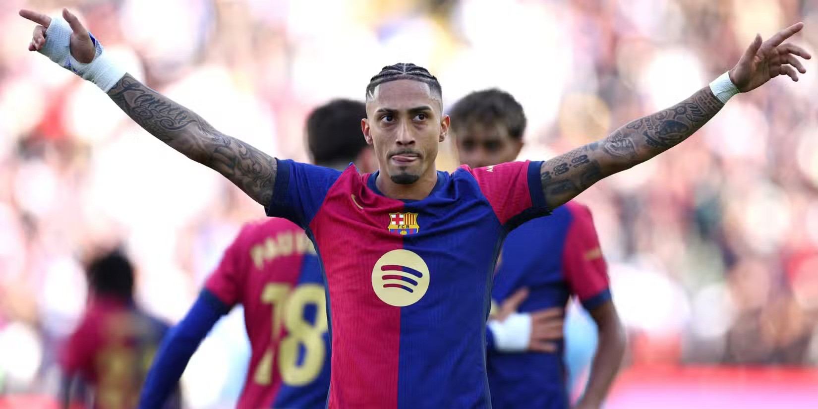 Raphinha celebrates after scoring for Barcelona