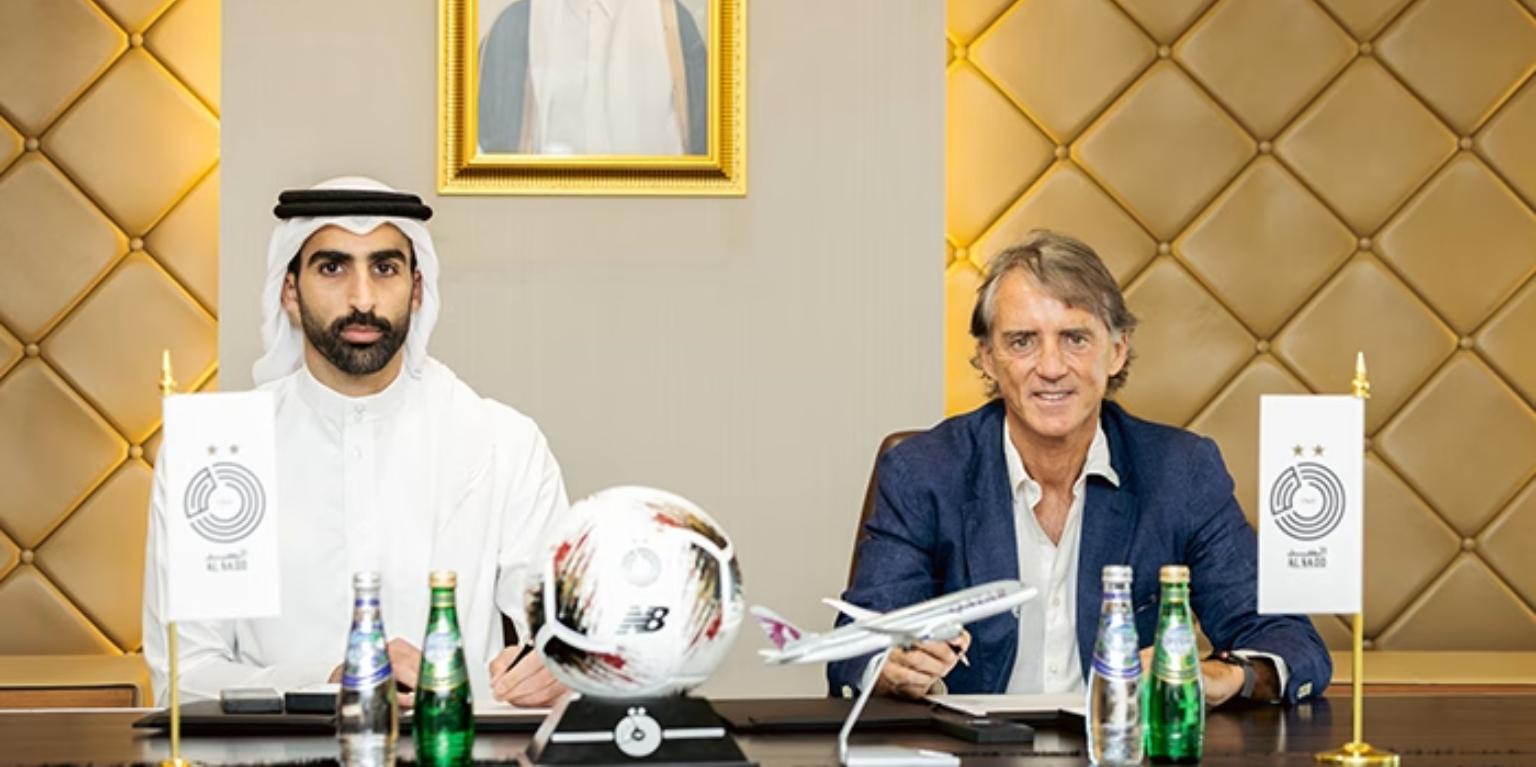 Roberto Mancini signing a contract to become Al-Sadd head coach