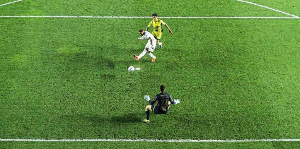 Neymar scores a goal for Santos