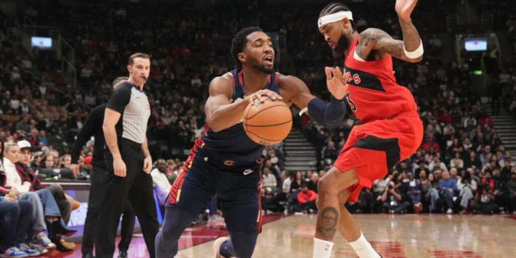 Donovan Mitchell guarded by Brandon Ingram