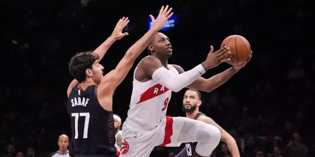 RJ Barret attacking Brooklyn's basket through Ben Saraff's defence