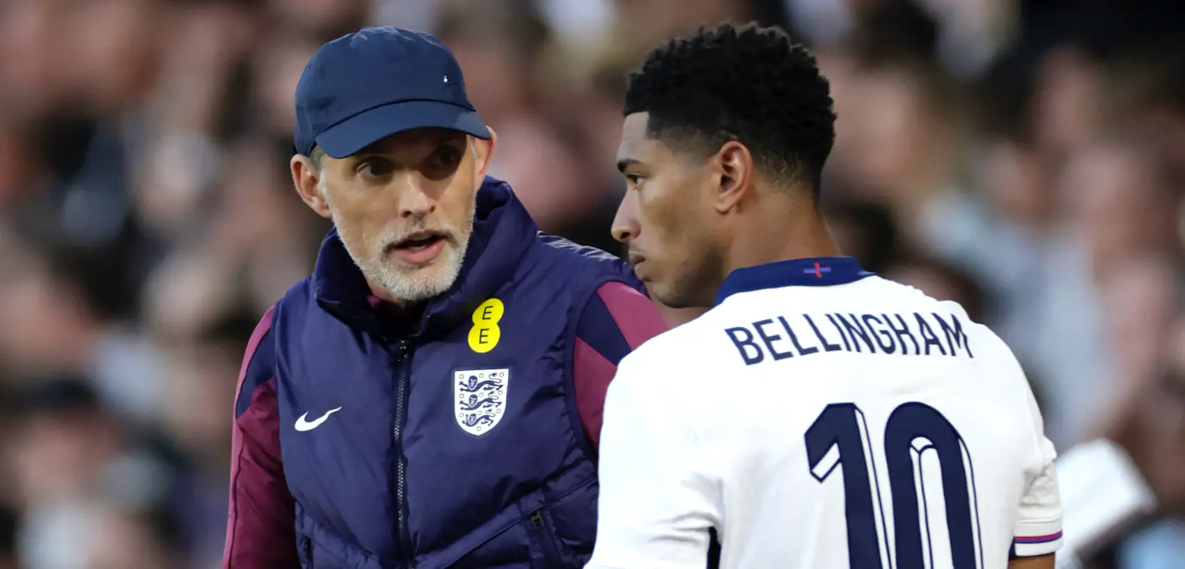 England manager Thomas Tuchel giving instructions to Jude Bellingham
