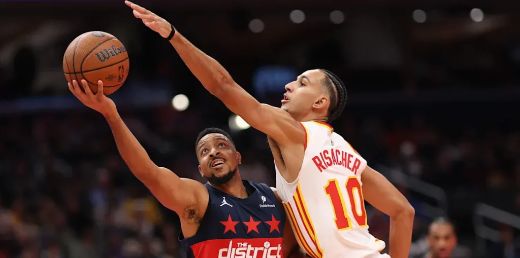 CJ McCollum attempts a lay up