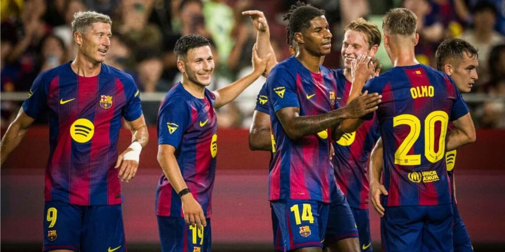 Barcelona players celebrate goal